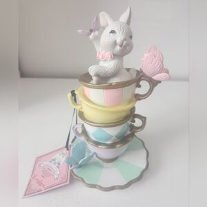 Tophat & Toil Easter bunny in stacked tea cups with Butterflies 7 In Resin